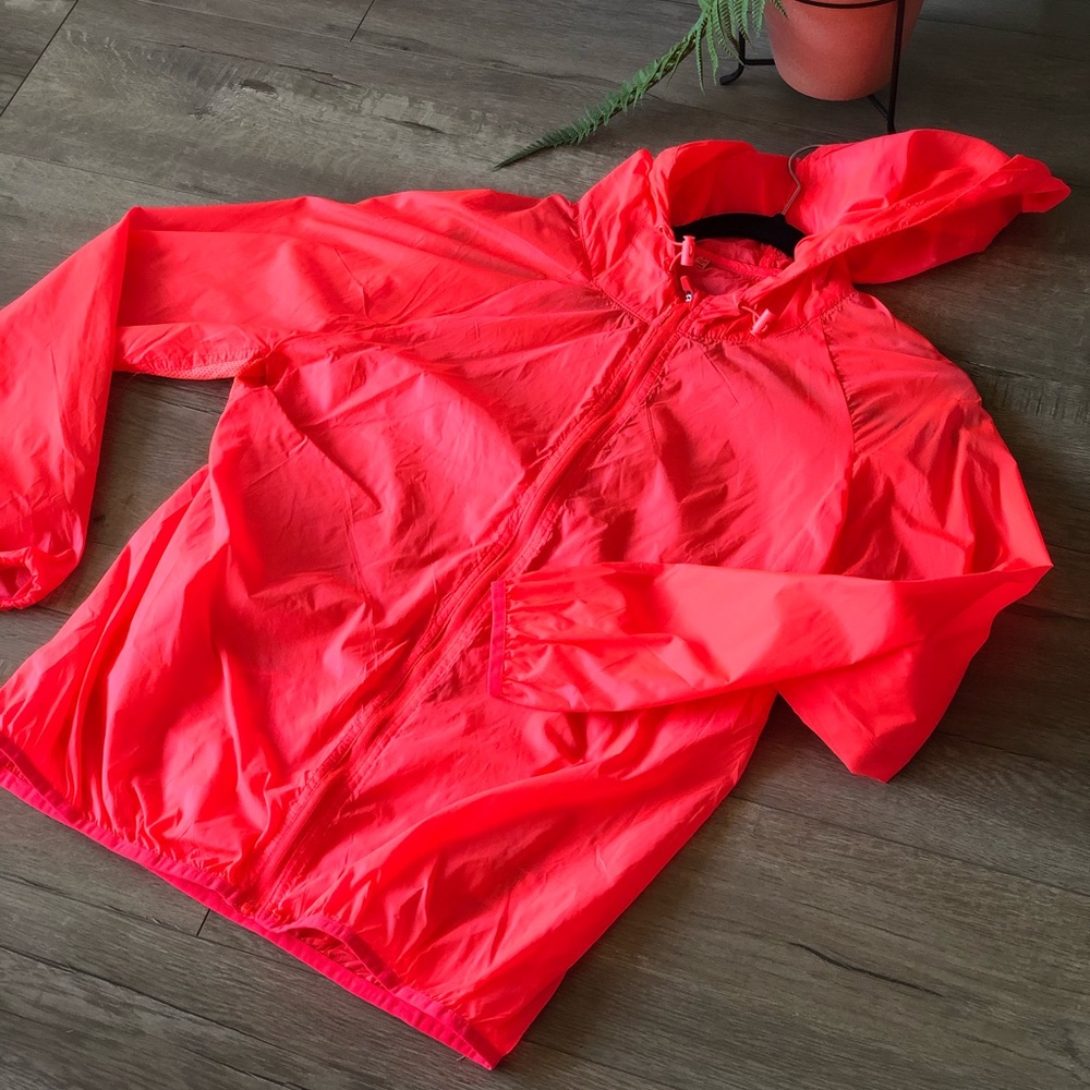Neon orangish pink water proof wind breaker